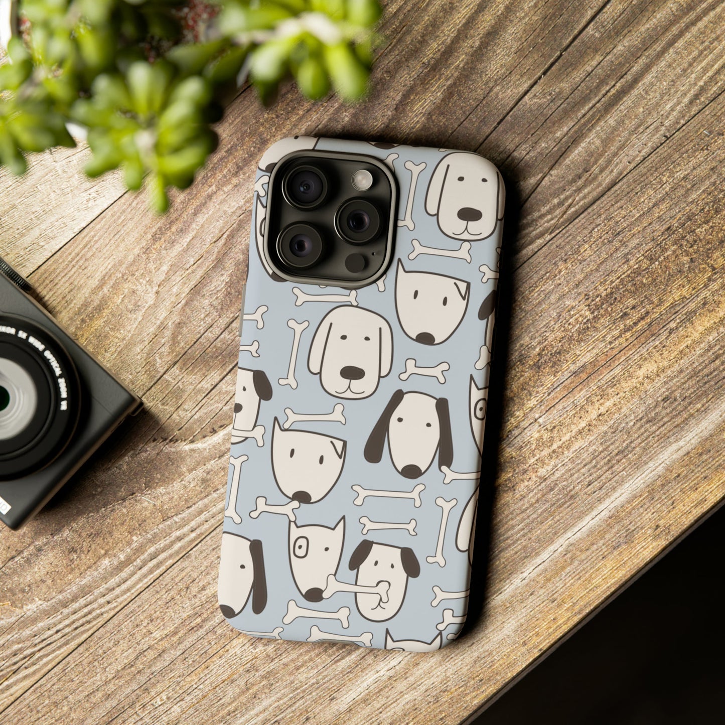 Durable Cases with Canine Design: light blue, white cartoon dogs and bones