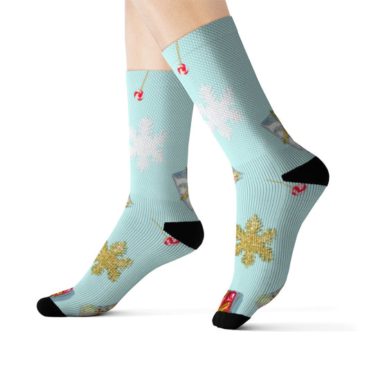 Novelty Socks for the Holiday Season: light aqua blue, black cocktail drinks and floral motifs, playful illustrated style