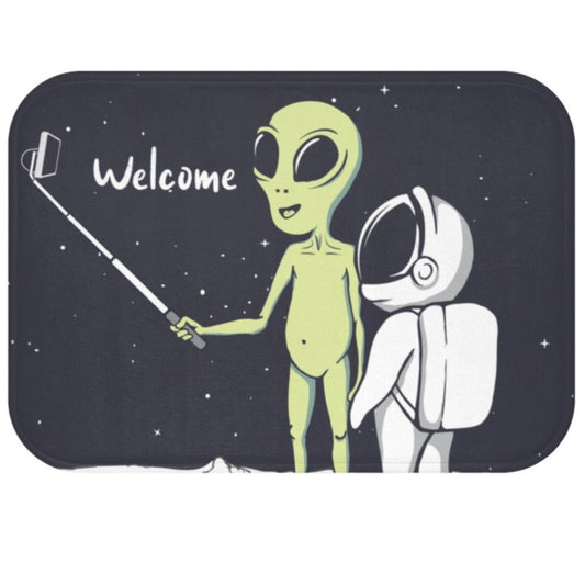 Extraterrestrial Snapping Self-Portrait Bath Mat: dark navy, black green alien and astronaut, cartoon, retro sci-fi style
