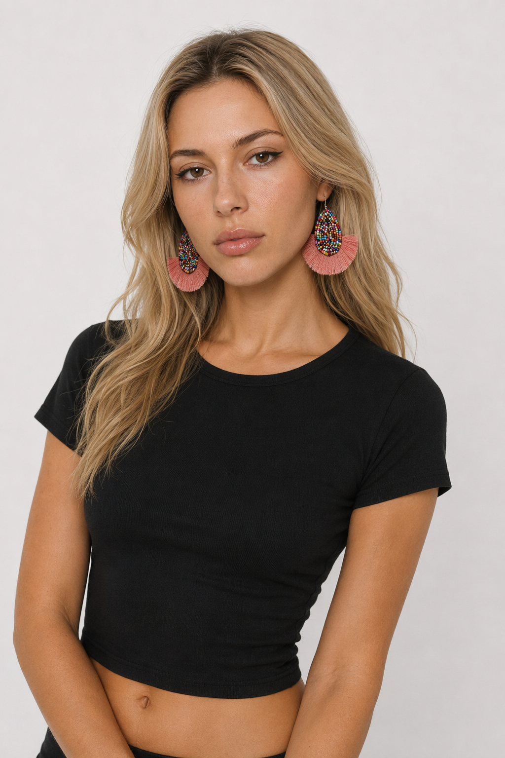 Vibrant Tasseled Waterdrop Earrings with Beaded Accents Pink