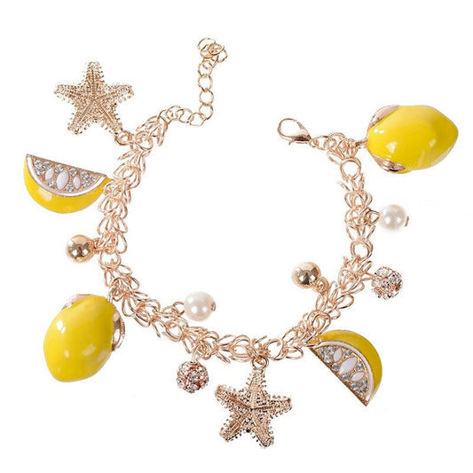 Lemon and Starfish Chain Bracelet: gold, yellow starfish and citrus fruit theme, playful nautical summer charm jewelry style