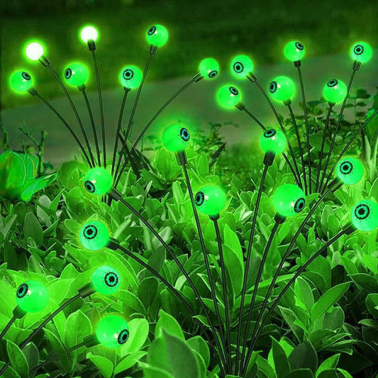 Set of 10 LED Solar Eye Ball Lights for Halloween (2 Packs): neon green, black glowing eyeballs, spooky cartoon style