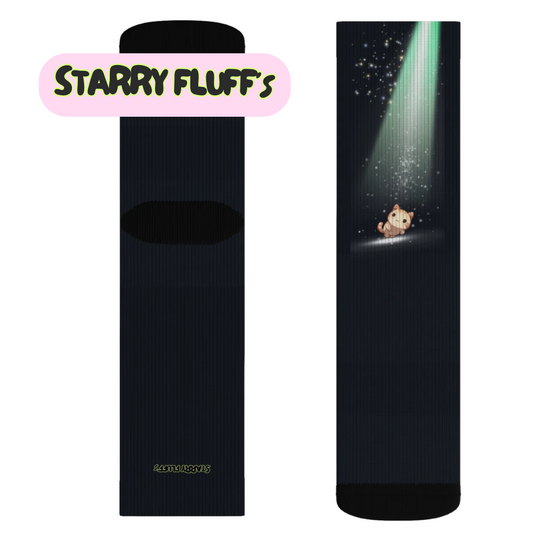 Cosmic Kitty Playful Novelty Socks: black, dark navy small cartoon animal under a starry light beam, cartoon, whimsical style