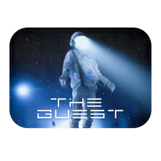 The Extraterrestrial Visitor Bath Rug: black, dark blue astronaut in space, sci-fi graphic style