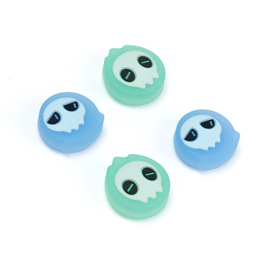 Halloween Ghost Thumb Grips for Switch: light blue, mint green cartoon ghost/skull-like face, cute cartoon style