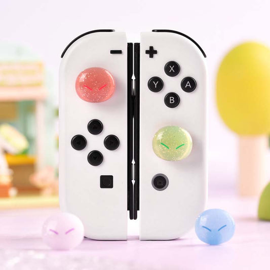Cute Glittering Slime Joystick Caps: white, black pair of game controller grips/controllers, cute, colorful gaming accessory