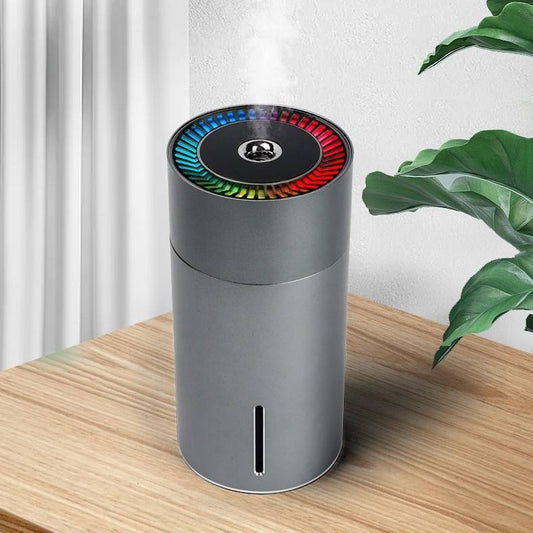 Portable Cordless Air Humidifier for Convenience: dark gray, black cylindrical electronic device, modern minimal style