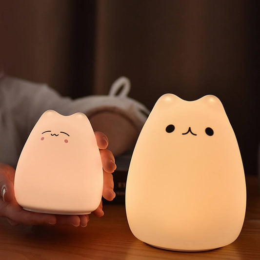 Cute Cat Nursery Lights with Sensor: warm white, pale peach cat, kawaii minimalist cartoon style