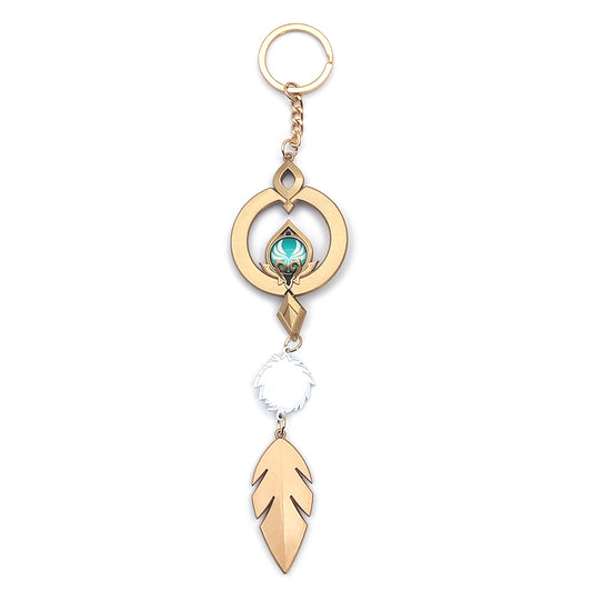 Genshin Impact Scaramouche Keychain: Glowing Vision: gold, turquoise ornamental feather motif, ornamental fantasy style